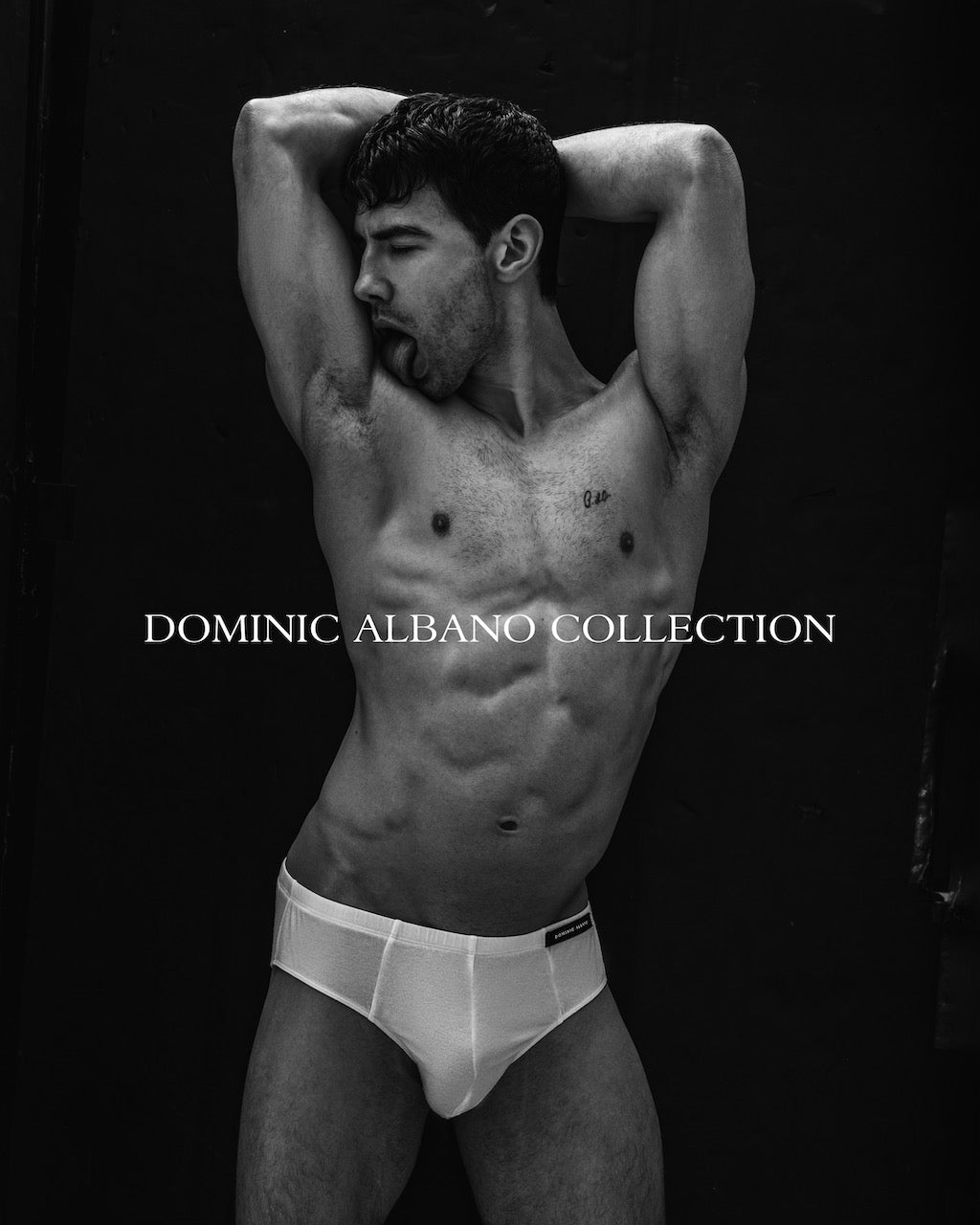 Dominic Albano posing for Dominic Albano Collection wearing Tencel white brief