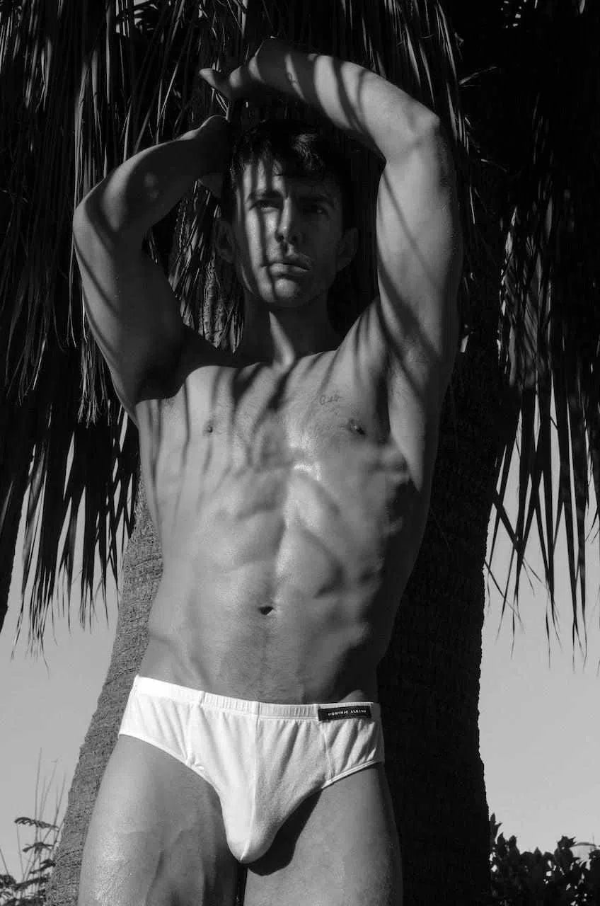 Male model wearing Dominic Albano Collection white Tencel brief underwear
